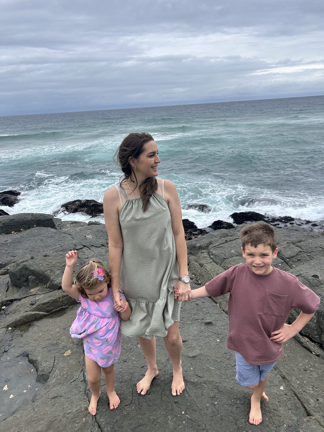 Yolande and her two children at the beach